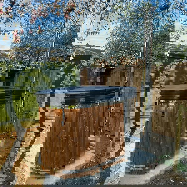 Ofuro wood-fired tub with integrated heater