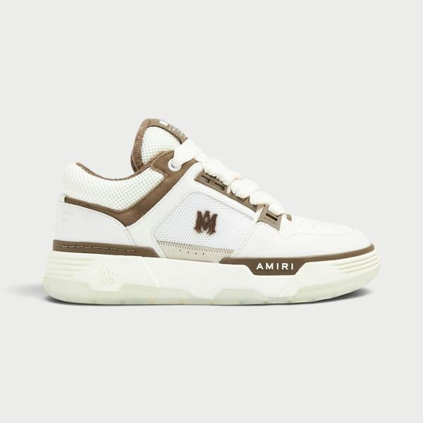 Supplied Fashion AMIRI MA-1 low-top sneakers in white and brown leather with signature branding and mesh detailing