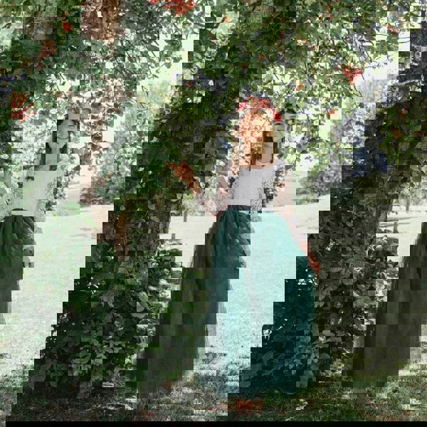 girl in a park wearing Bohemian Classic Long Sleeve Dress in Hunter Green