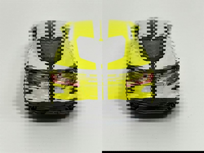 Burago 2020 Chevrolet Corvette Stingray Coupe Yellow Black Stripes 1:43 Scale - 183000