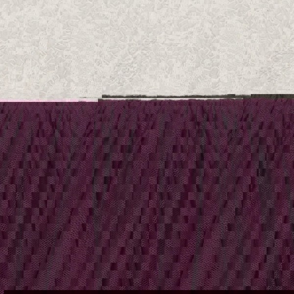 Close-up of a purple textured fabric against a white lace background
