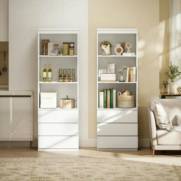 Pair of white bookcases with open shelves and drawers, arranged in a living room.