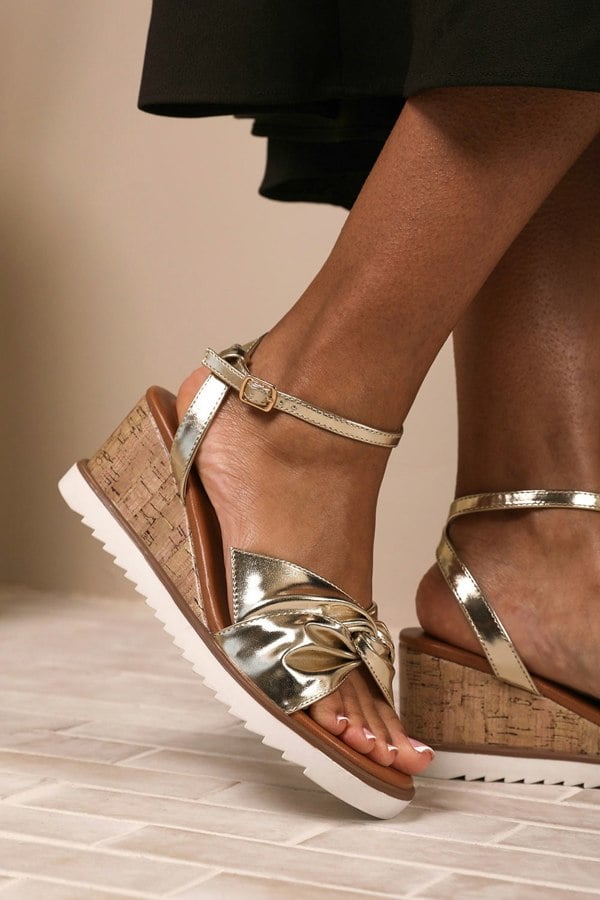 Where's That From Katara Wide Fit Knot Detail Wedge Shoes With Buckle Ankle Strap in Gold Metallic Pu