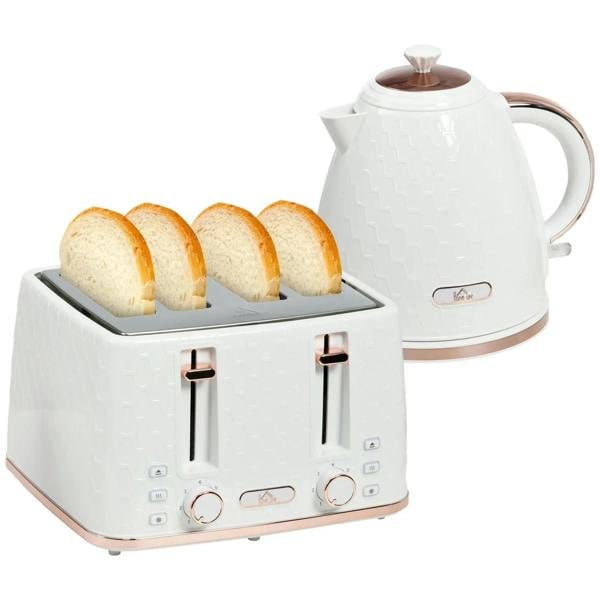 White electric kettle and four-slice toaster set with bread slices on the toaster