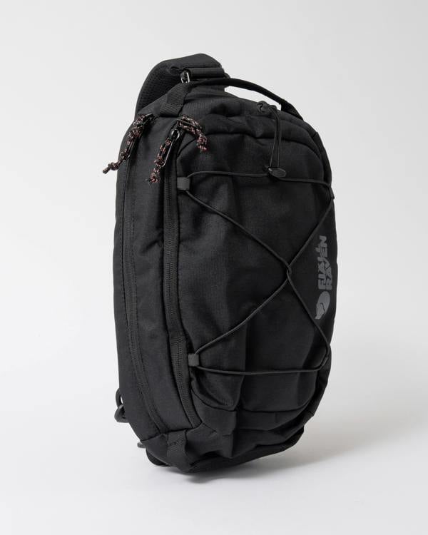 front of a Fjallraven Skule 6L Unisex Sling Bag in Black 550