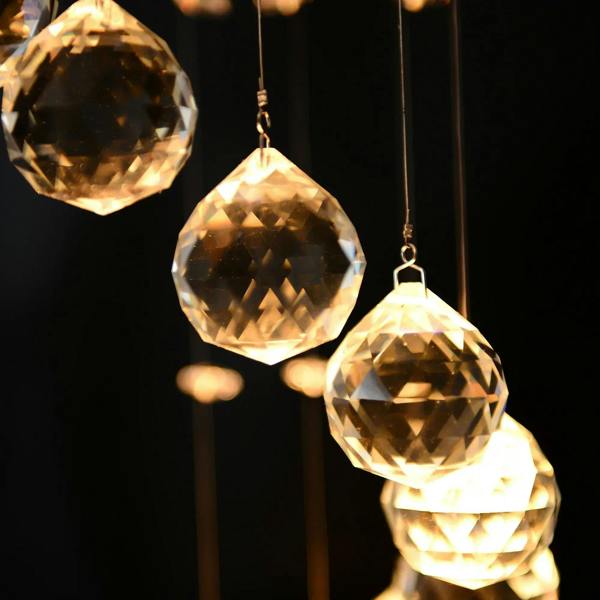 Warm glowing crystal bead chandelier pendant with faceted glass drops