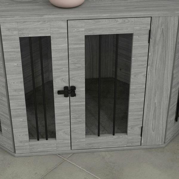 Close-up of grey dog crate furniture with black-barred doors and central latch