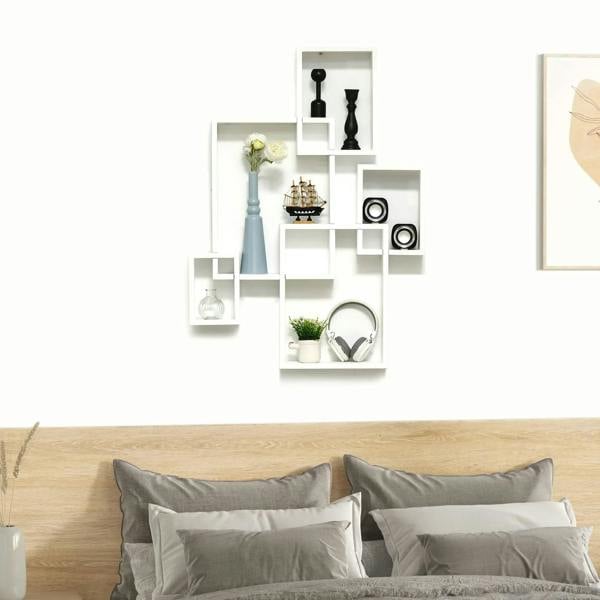 White interlocking cube wall shelves with open square compartments for decor