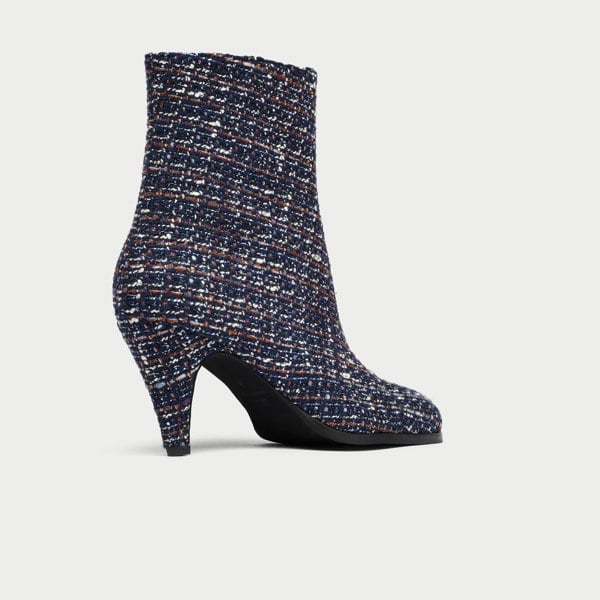 Maya Tweed ankle boot on a light gray background