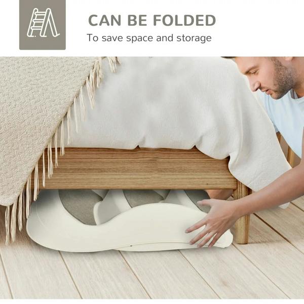 Foldable cream pet stairs with gray non-slip treads, folded for storage