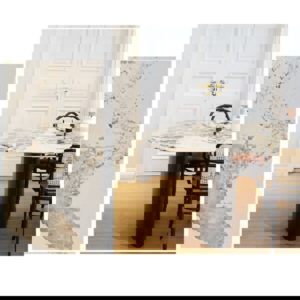 Tambo Dining Table, Pebble Shape, Sintered Stone in a lifestyle setting with dining table and six chairs