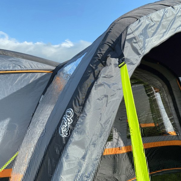 An image of the OLPRO Charcoal & Orange Cocoon Breeze Campervan Awning Extension attached to the Cocoon Breeze that has been fixed to a VW Campervan.