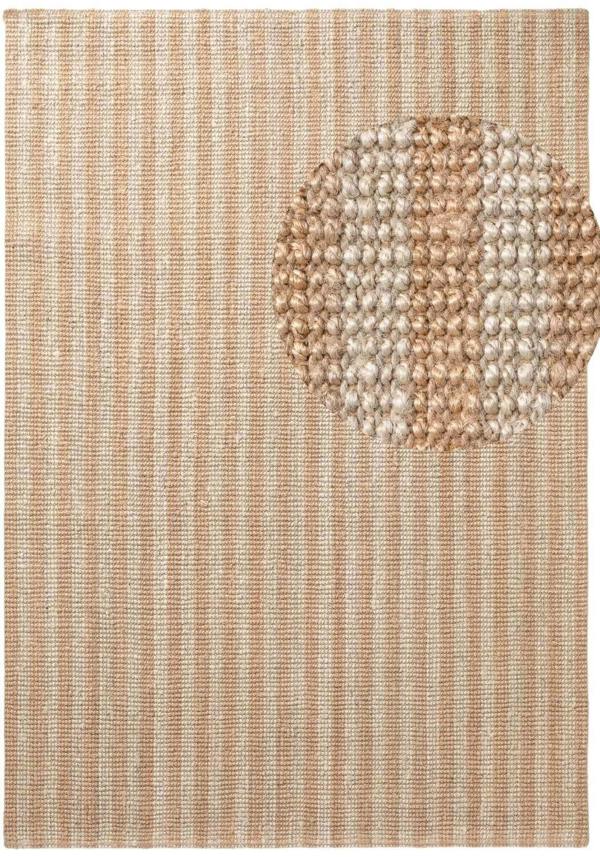 Textured rug with a circular pattern in a neutral color palette