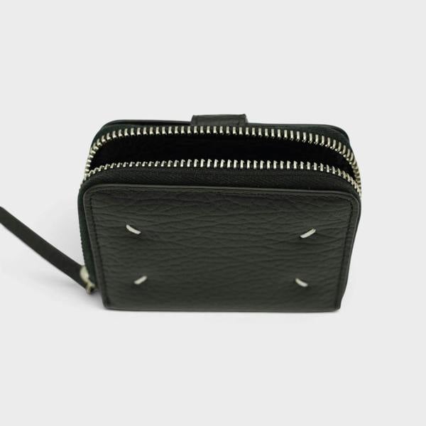 Supplied Fashion Maison Margiela black leather coin pouch with signature white four-stitch detail and silver zipper.