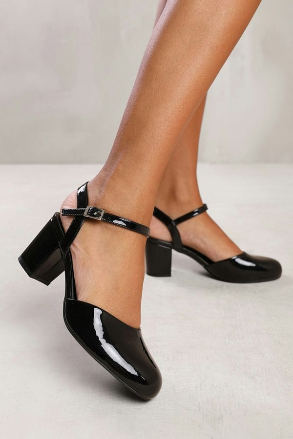 Where's That From Guelder Wide Fit Round Toe Mid Block Heel With Strap in Black Patent