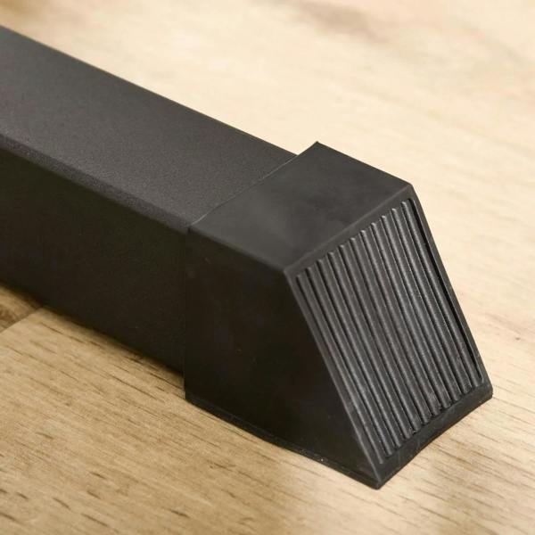 Black foam base pad on the power tower foot for stability and grip