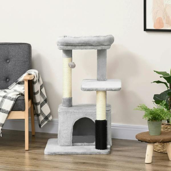 Grey cat climbing tower with two condos, multiple perches, and black scratching post