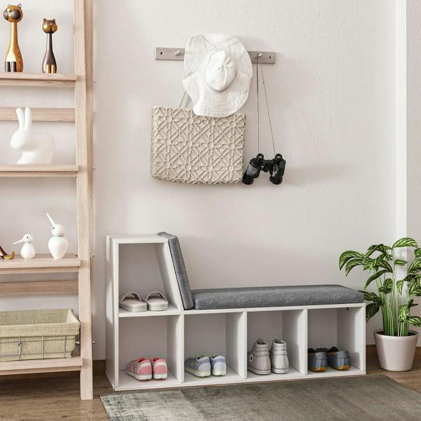 White bookcase storage shelf with gray cushioned bench and cubby shoe storage