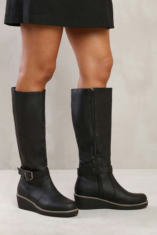 Where's That From Vanda Wedge Heel Knee High Boots With Elastic Panel in Black