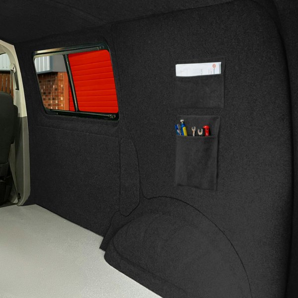 Anthracite grey storage pouches with a soft texture, featuring multiple pockets for organizing tools and supplies in a vehicle interior