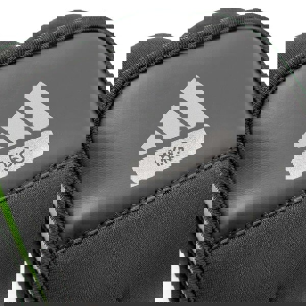 Black ankle/wrist weight with Adidas logo and '1.5KG' label on a white background