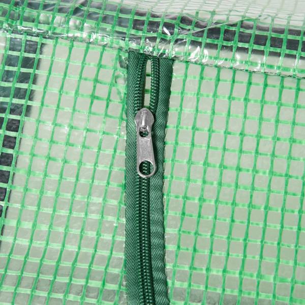 Close-up of green mesh PE cover with zipper and pull tab on mini greenhouse