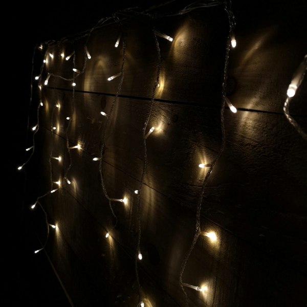Samuel Alexander 960 LED 23.8m Snowing Iciclebrights Indoor Outdoor Multifunction Christmas Icicle Lights on Clear Cable with Timer in Warm White