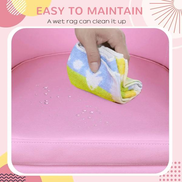 Pink upholstered armchair seat being cleaned with a wet cloth