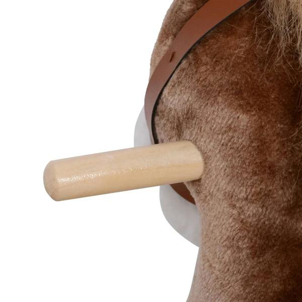 Wooden handle grip attached to brown plush rocking horse body