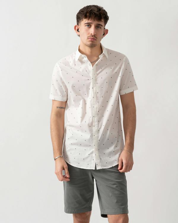 studio shot of a model wearing an Armani Exchange Mens Short Sleeve Shirt with Geometric Pattern in Off White F0198
