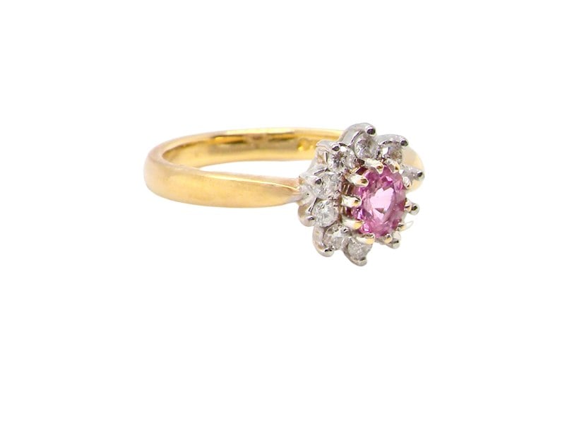 A Pink Sapphire and Diamond Ring siude view