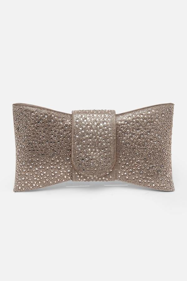Crystal Luxe Bow Clutch Bag Rose Gold, drawing attention to magnetic flap fastening