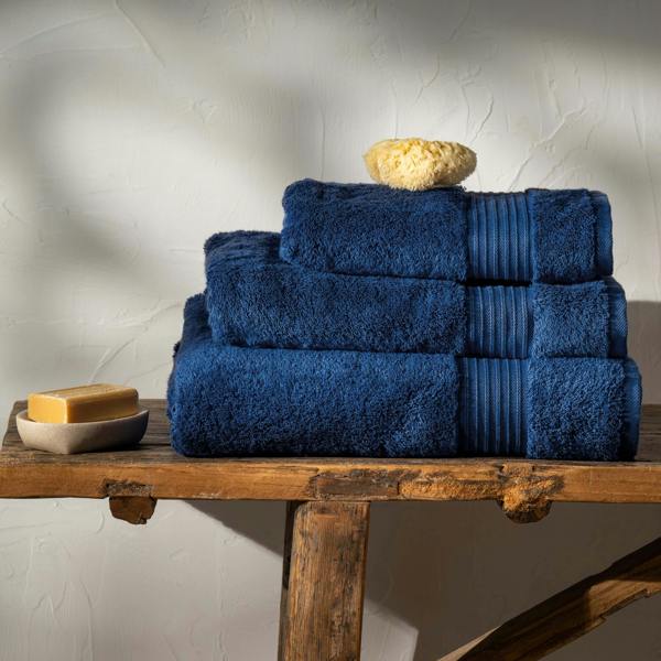 Mediterranean Blue Luxury Egyptian Cotton Bath Sheet styled in a bedroom | Soak and Sleep