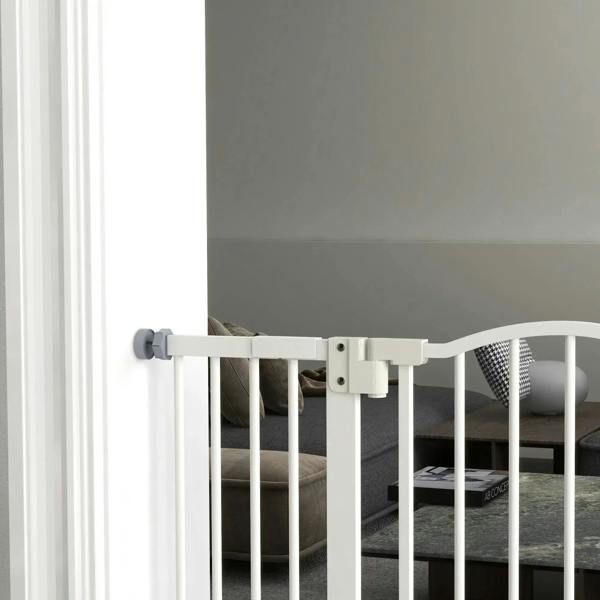 White adjustable pet gate with auto-close door latch in doorway position