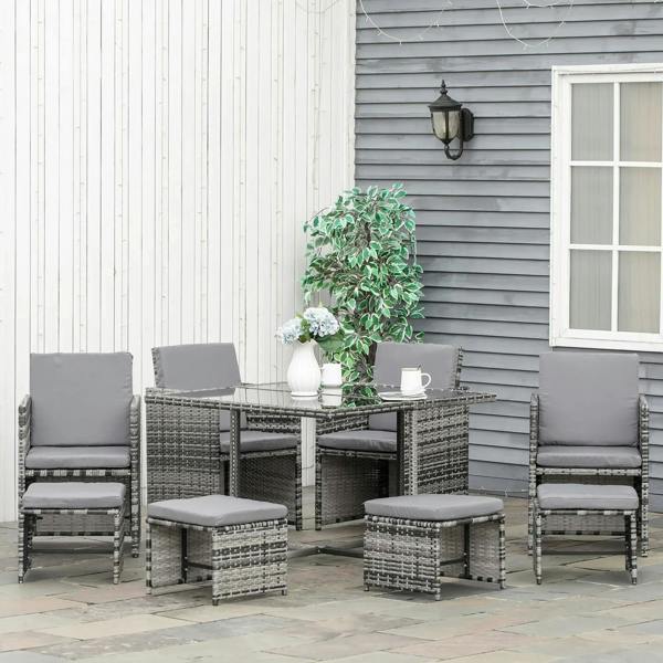 Grey rattan dining set with table and eight chairs, seat cushions included