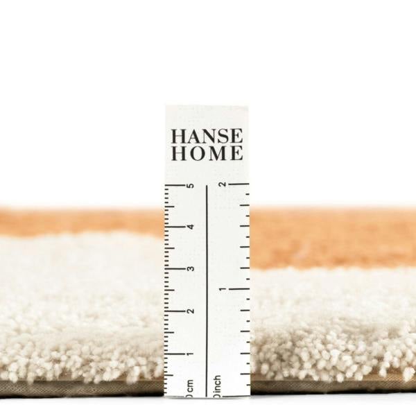 Hanse Home rug with a ruler for scale on a white background