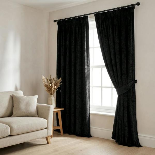 Lustre made-to-measure curtains in Black, styled in a living room