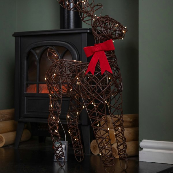Samuel Alexander 60cm Battery Operated Light up Christmas Reindeer with Red Bow & Warm White LEDs