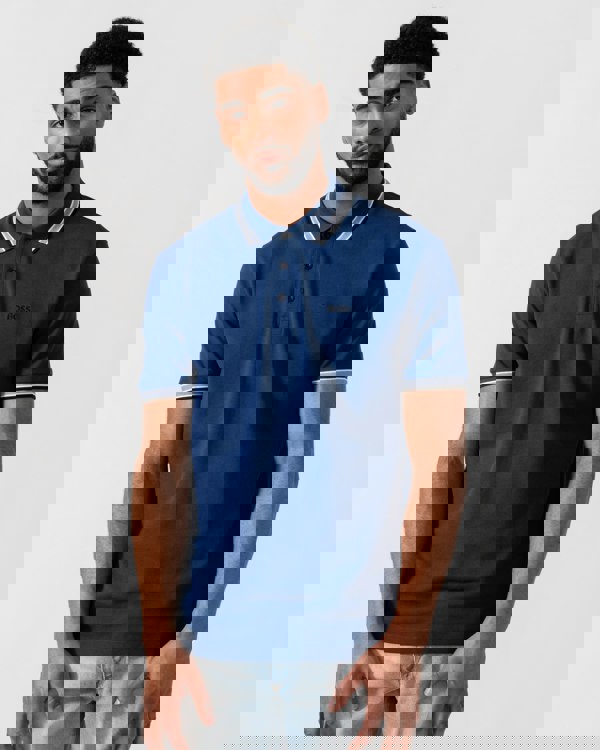 Model wearing BOSS Green Mens Paddy Cotton-Piqué Polo Shirt with Contrast Logo in Navy 419 - Main