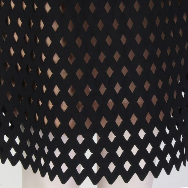 Alaia layered skirt in a black diamond mesh top layer