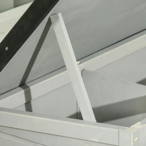 Grey hutch roof support strut holding a black asphalt roof panel