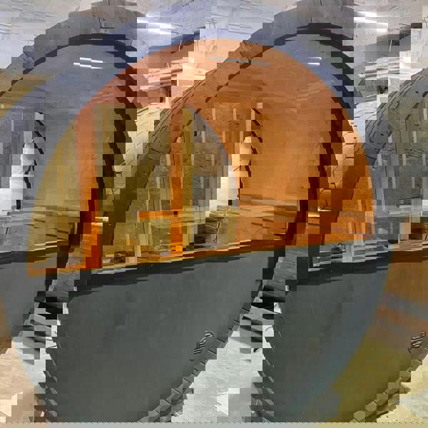 Barrel sauna with window.