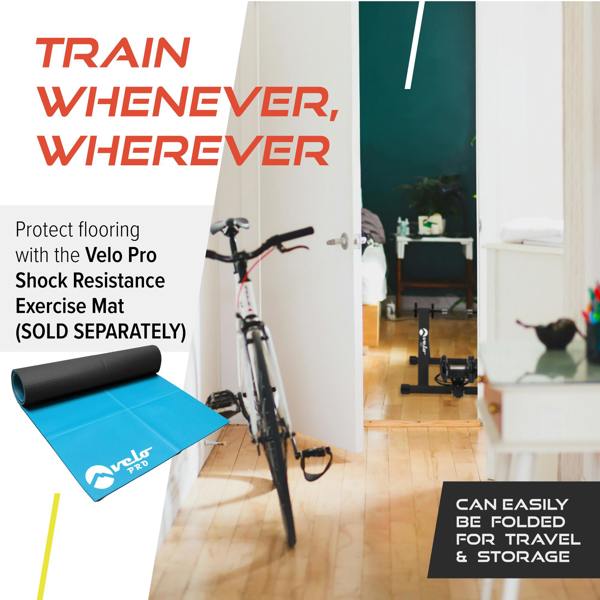 Velo Pro Black Magnetic Turbo Trainer in a bright room with a bike, showcasing its compact design and easy storage features