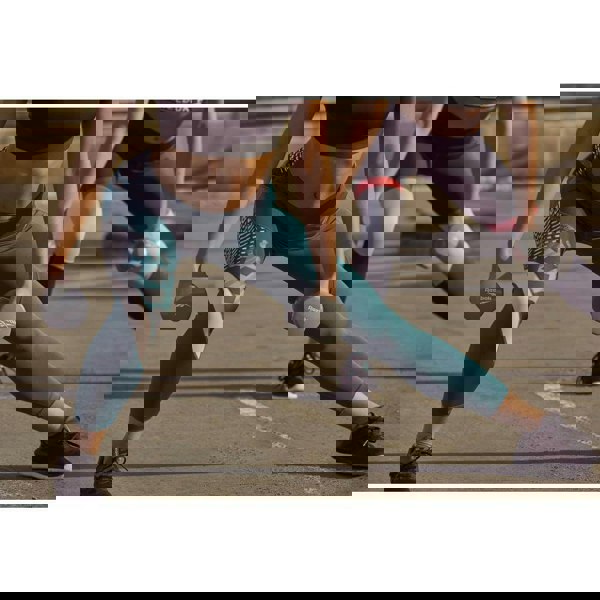 Two women exercising outside using Reebok 3kg Dumbbells