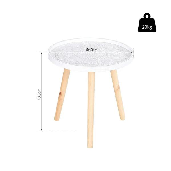 Round white side table with carved floral top and four light wood legs