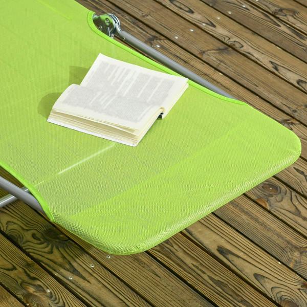 Close-up of green mesh seat and padded headrest on a steel-framed sun lounger
