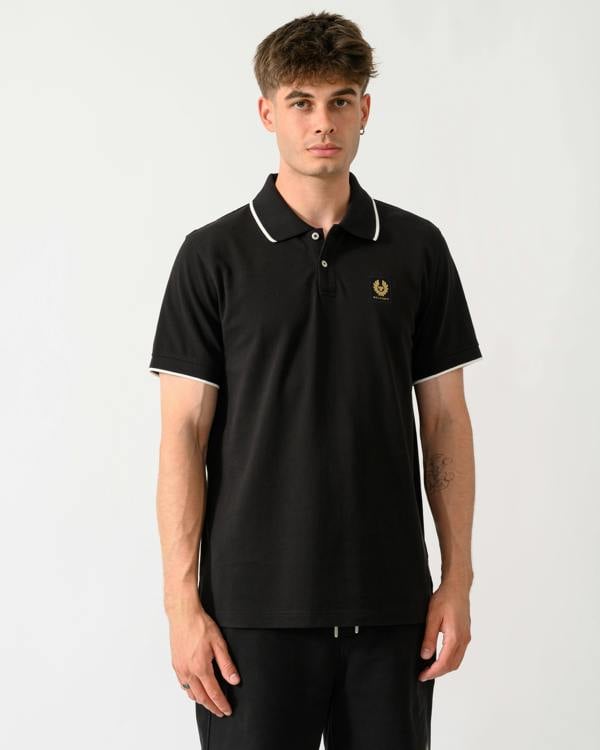 model wearing a Belstaff Mens Tipped Polo Shirt in Black