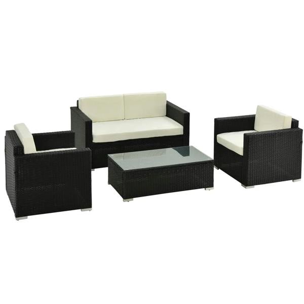 Black rattan sofa set with cream cushions and matching glass-top coffee table