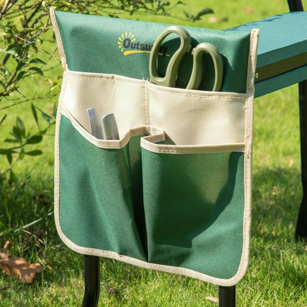Green and beige tool bag with multiple pockets attached to garden kneeler