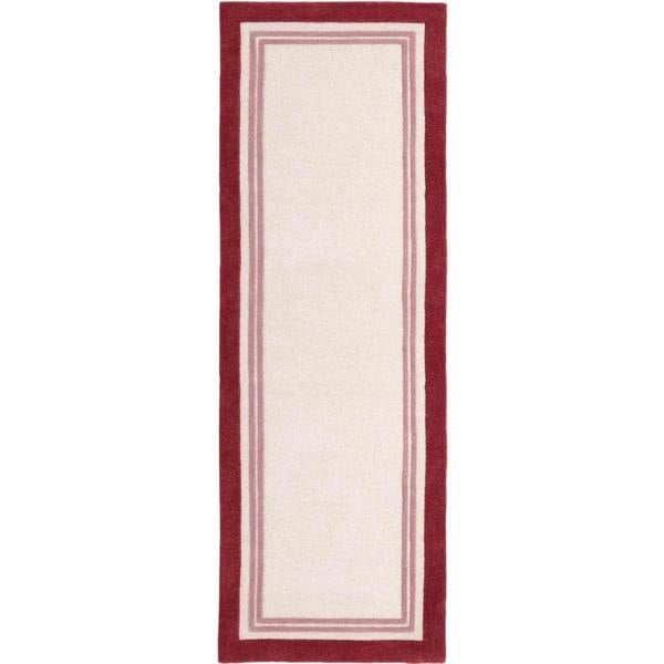 Rectangular rug with a red border on a white background